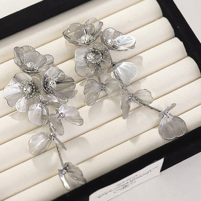 Cascading floral earring with crystal center – Broki