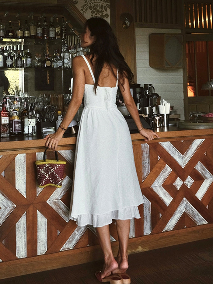 Ava - Flowy Women's Wedding Guest Dress with Ruffle Hem and Button Detail