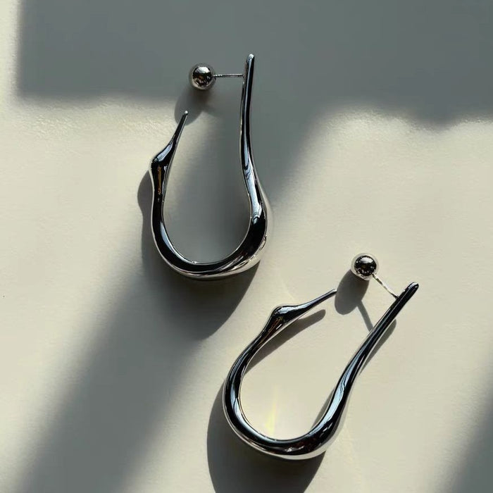 Sculpted drop earrings with a smooth curve - Alkasa