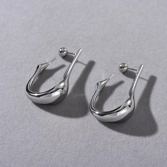 Sculpted drop earrings with a smooth curve - Alkasa