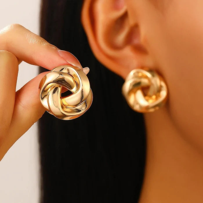 twisted dome stud earrings with polished finish – SELMAR